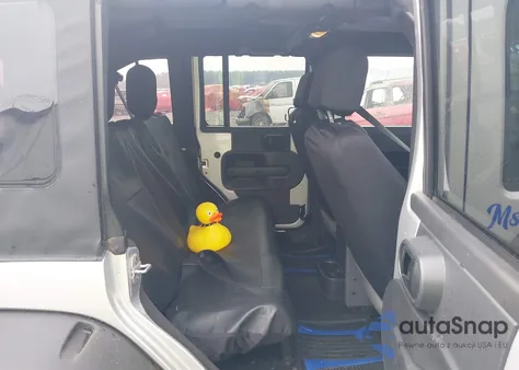 2009 Jeep Wrangler Unlimited X from USA, damaged, VIN 1J4GB391X9L761775